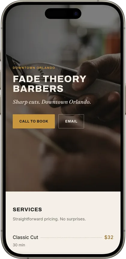 Fade Theory Barbers demo site on a phone